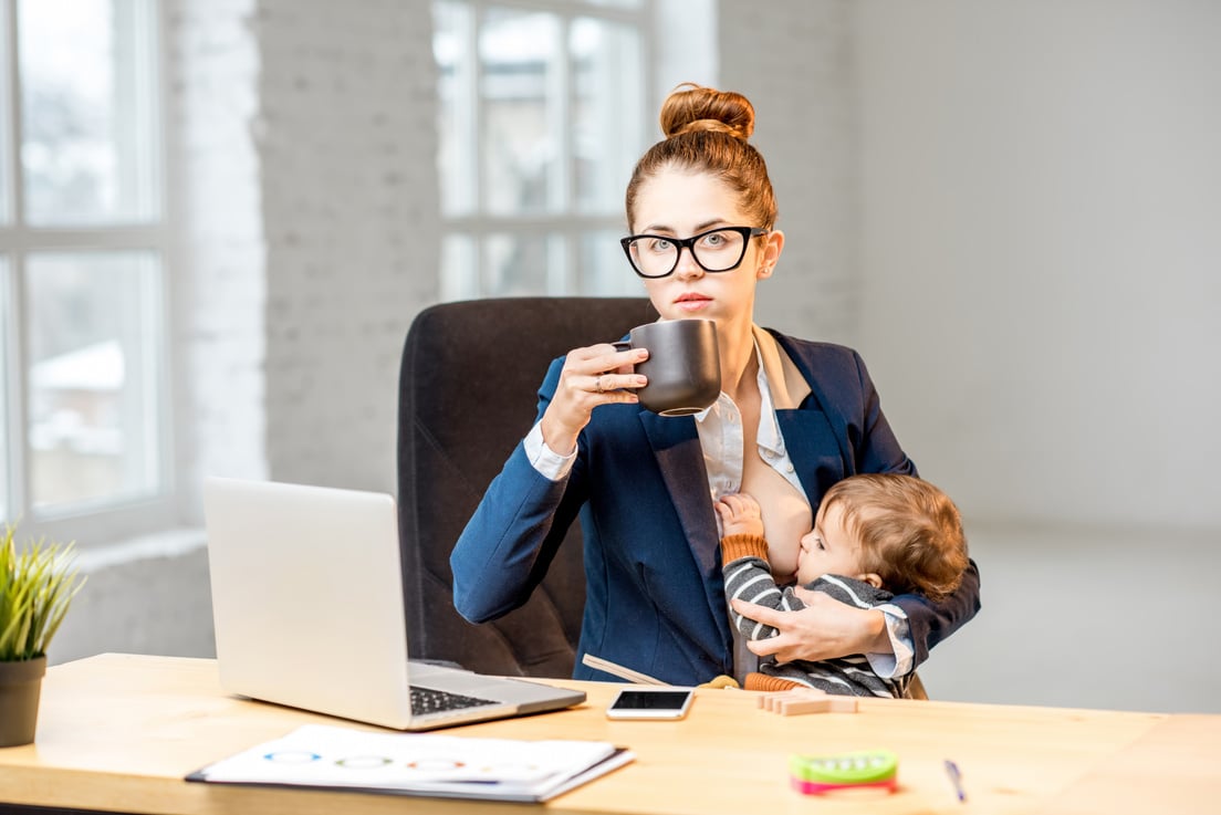 Working Mother Breastfeeding in the Office 