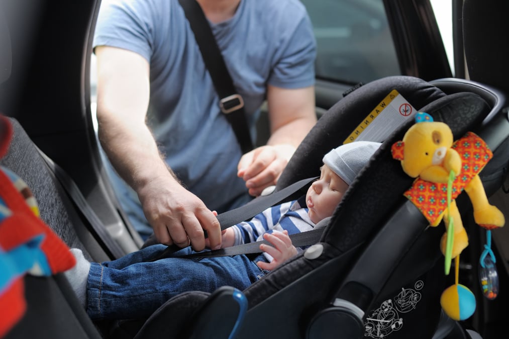 Little Boy in Car Seat