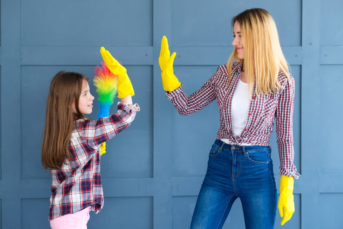 family teamwork household chores mom kid high five